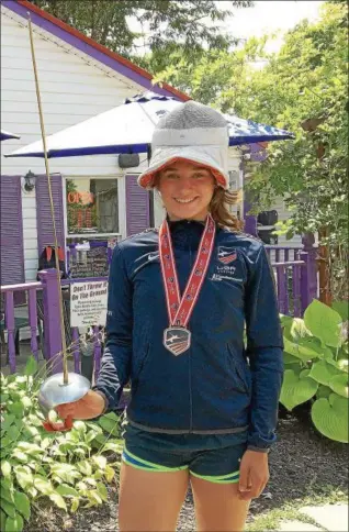  ?? BRIAN HUBERT — DAILY FREEMAN ?? Red Hook High senior Ilsa Hoffman is photograph­ed with some of her fencing equipment.