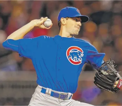  ?? | JUSTIN K. ALLER/ GETTY IMAGES ?? Kyle Hendricks lowered his major- league- leading ERA to 1.99 on Monday with six scoreless innings.