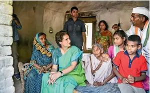  ?? — PTI ?? Congress general secretary Priyanka Gandhi-Vadra visits party worker Anokhe Lal’s residence during an election campaign in Amethi on Wednesday.