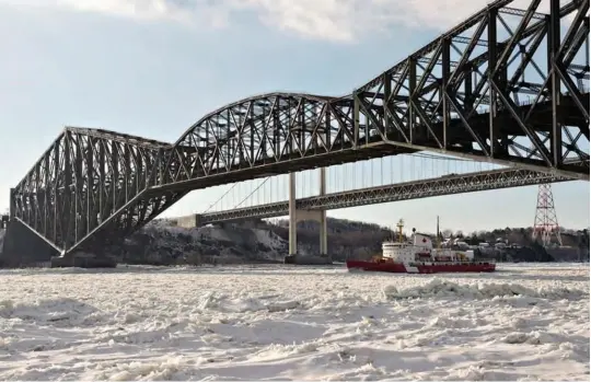  ??  ?? The Quebec Bridge is the longest cantilever steel railway bridge in the world. Portions of it fell down twice before it was finally complete in 1917. It is the sister bridge to the Firth of Forth Rail Bridge and similar in constructi­on technique. The Riviere du Gouffre is unusual entering the St Lawrence as the upper half is saltwater while the lower portion is fresh water