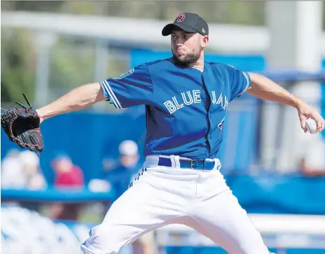  ?? FRANK GUNN / THE CANADIAN PRESS ?? Tim Mayza is battling to land a middle relief role with the Toronto Blue Jays during spring training.