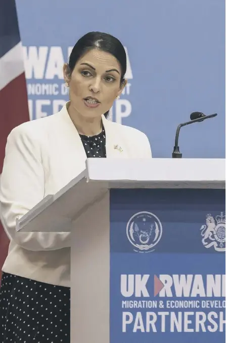  ?? ?? 2 Priti Patel speaks to the media in Rwanda after signing what the two countries called an ‘economic developmen­t partnershi­p’