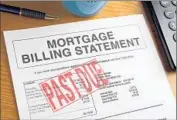  ?? Kirby Hamilton Getty Images ?? WHEN UNIT OWNERS default on their mortgages and stop paying their assessment­s, stress on a community associatio­n’s finances can become extreme.