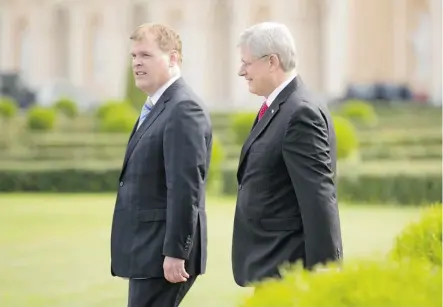  ?? Adrian Wyld/the Canadian Press ?? Prime Minister Stephen Harper and Foreign Affairs Minister John Baird, left, have come under fire from former diplomats over foreign policy.