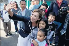  ?? By Eduardo Verdugo, AP ?? “Nobody gave me anything”: Josefina Vázquez Mota, candidate for the National Action Party (PAN), greets people March 30 in Mexico City.