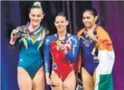  ?? TWITTER ?? Aruna Reddy (right) with gold medallist Tjasa Kysslef of Slovenia (centre) and silver medallist Emily Whitehead of Australia.