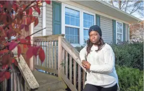  ??  ?? Latoya Gatewood-Young found five people were on the title to her grandfathe­r’s house in Maryland, which has been in her family for a century.