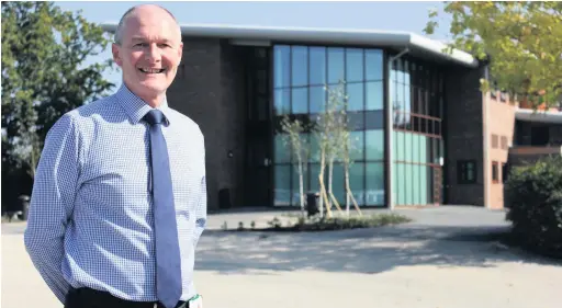  ??  ?? Peter Rubery outside the Academy’s new facilities