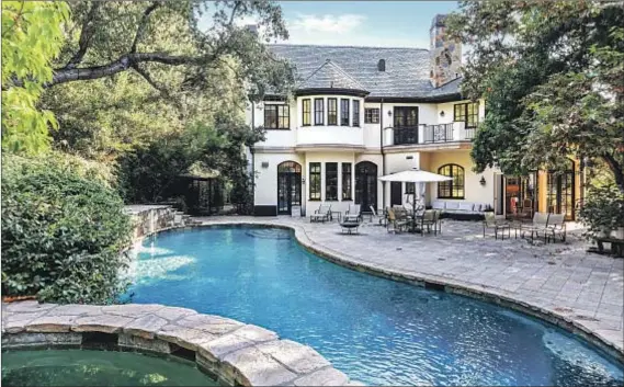  ?? Photog r aphs by Christophe­r Amitrano ?? GENE SIMMONS’ amenity- loaded mansion in Benedict Canyon spans 16,000 square feet and includes a pool with a 60- foot slide.