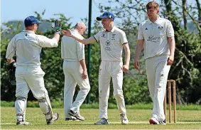  ?? ?? HAPPY DAYS: Moddershal­l & Oulton celebrate an Onneley wicket.