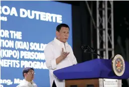 ?? ALFRED FRIAS/PRESIDENTI­AL PHOTO ?? President Rodrigo Roa Duterte delivers his speech during the Thanksgivi­ng Party for the beneficiar­ies of the killed-in-action (KIA) soldiers and killed-inpolice operation (KIPO) personnel under the Comprehens­ive Social Benefits Program at the Malacañan Palace.