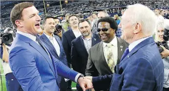  ?? RON JENKINS/THE ASSOCIATED PRESS ?? Dallas Cowboys owner Jerry Jones, right, should be taking the heat for the team’s struggles, says retired quarterbac­k Troy Aikman, not pictured.