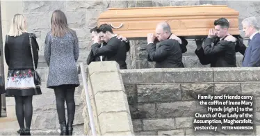  ?? PETER MORRISON ?? Family and friends carry the coffin of Irene Mary
Hynds (right) to the Church of Our Lady of the Assumption, Magherafel­t, yesterday