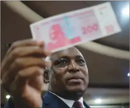  ?? ?? Reserve Bank of Zimbabwe governor John Mushayavan­hu