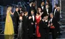  ?? Getty Images ?? La La Land producer Jordan Horowitz (lower left) stops the show to announce the actual Best Picture winner as Moonlight in 2017/ Photograph: Kevin Winter/