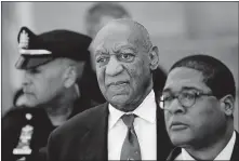  ?? ASSOCIATED PRESS FILE PHOTO] ?? In this April 26, 2018, photo, Bill Cosby, center, leaves the Montgomery County Courthouse in Norristown, Pa., after being convicted of drugging and molesting a woman. [MATT SLOCUM/