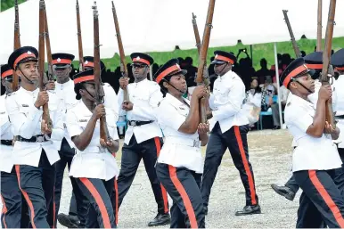  ?? NORMAN GRINDLEY/CHIEF PHOTO EDITOR ?? New members of the JCF at a recent graduation ceremony.