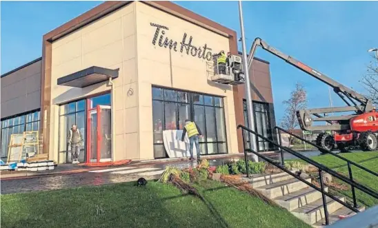  ?? ?? OPENING: Tim Hortons is the latest chain restaurant business to open as local eateries are already fighting for survival.