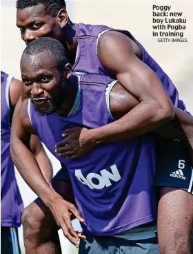  ?? GETTY IMAGES ?? Poggy back: new boy Lukaku with Pogba in training