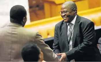  ?? Picture: ESA ALEXANDER ?? WHERE’S THE SHEBEEN? ANC members welcome former Eskom CEO Brian Molefe in the National Assembly after he was sworn in as an MP this week. He will have the use of a free house in Cape Town, if he wants it