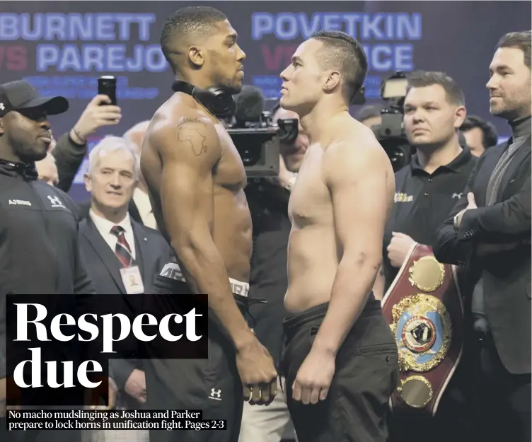  ??  ?? Anthony Joshua, left, and Joseph Parker at the weigh-in at the Motorpoint Arena in Cardiff ahead of their world heavyweigh­t unificatio­n fight at the Principali­ty Stadium this evening.