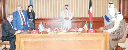  ??  ?? KUWAIT: His Highness the Crown Prince Sheikh Nawaf Al-Ahmad Al-Jaber Al-Sabah attends the signing ceremony of an agreement between Kuwait and Nicaragua yesterday. — KUNA