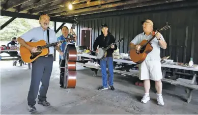  ?? BY ROGER PIERSON ?? The Bean Hollow Boys entertain at Rappahanno­ck County Park on Sunday afternoon, including (from left) Richard Brady, Lowell Kline, Tyler Johnson and Doug Bywaters.