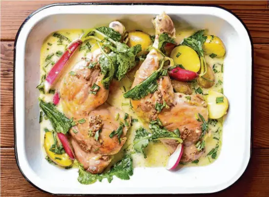  ?? Christian Reynoso/Special to The Chronicle ?? Tarragon Chicken With Radishes and Little Potatoes brings a French vibe.