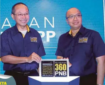  ??  ?? ABDUL Wahid (kiri) bersama Abdul Rahman pada Majlis Prapelanca­ran MSAM 2018 di Menara PNB, semalam.