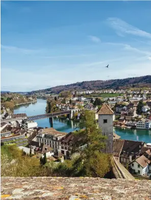  ??  ?? Above: Looking southeast from the battlement­s of Schaffhaus­en’s 16th-century Munot fort, with the Rhine River flowing downstream from Stein am Rhein.