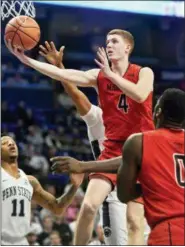  ?? ABBY DREY — CENTRE DAILY TIMES VIA AP, FILE ?? In this file photo, Maryland’s Kevin Huerter goes to the basket against Penn State during an NCAA college basketball game, in State College, Pa. Huerter declared for the NBA draft thinking that it was going to be an explorator­y mission, one that might...