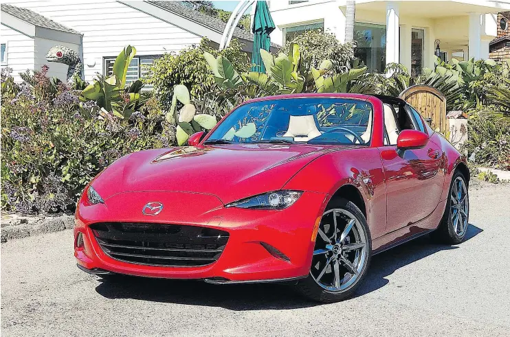  ?? PHOTOS: BRIAN HARPER/DRIVING.CA ?? The 2017 Mazda MX-5 RF’s electric-powered convertibl­e roof opens or closes in just 13 seconds.