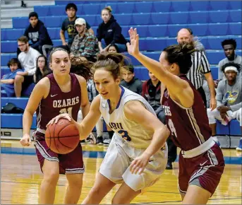  ?? Photo courtesy of JBU Sports Informatio­n ?? John Brown senior Jana Schammel drives into the paint during Monday’s game against College of the Ozarks at Bill George Arena.