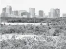  ?? SENTINEL JOE BURBANK/ORLANDO ?? A view of the Orlando skyline from Orlando Internatio­nal Airport.