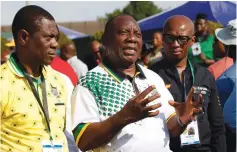  ?? (Rogan Ward/Reuters) ?? CYRIL RAMAPHOSA (center), the newly elected president of South Africa’s African National Congress party, meets with reporters yesterday in Johannesbu­rg together with two party officials.