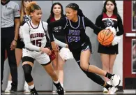  ?? (NWA Democrat-Gazette/Caleb Grieger) ?? Fayettevil­le’s Syniah Coachman (right) drives to the basket against Springdale’s Jakayla Bunch on Tuesday in a 6A-West Conference game at Bulldog Gymnasium in Springdale. Coachman and the Bulldogs won 56-39.