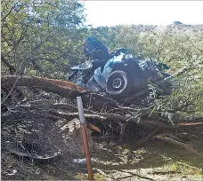  ?? ARIZONA DEPARTMENT OF PUBLIC SAFETY VIA AP ?? The scene where authoritie­s say they rescued a seriously injured woman who spent six days in the desert after crashing her car near Wickenburg, Ariz. The Department of Public Safety said Wednesday that rescuers found the dehydrated 53-year-old woman on Oct. 18 after following the vehicle’s tracks.