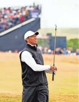  ?? ROB SCHUMACHER/USA TODAY SPORTS ?? Tiger Woods reacts after taking a shot on the sixth hole during the second round of the British Open on July 15.