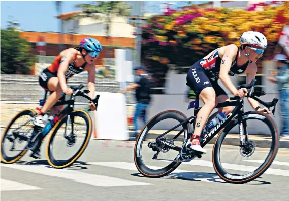  ?? ?? On a new track: Georgia Taylor-brown (right) winning last year’s World Triathlon Series in Cagliari; (below) with her individual silver medal from Tokyo 2020