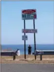  ?? WAYNE PARRY — THE ASSOCIATED PRESS ?? In this photo, Andrew Provence, an attorney for the American Littoral Society, looks out at the ocean at the end of a street in Deal, N.J.