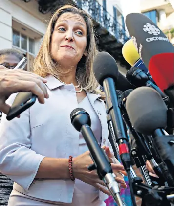  ??  ?? Chrystia Freeland, Canada’s foreign affairs minister, arrives for trade talks in Washington yesterday and addresses the media