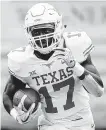  ?? Colin E. Braley / Associated Press ?? D’Shawn Jamison is one of the young faces in the Longhorns’ secondary this season.