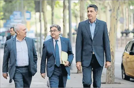  ?? SUSANNA SÁEZ / EFE ?? Enric Millo acudió al TSJC acompañado del líder de los populares catalanes, Xavier García Albiol