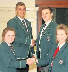  ??  ?? Out and In New head girl Emma Wishart with outgoing headgirl Celeste McGinley, Outgoing head boy Cameron Reece with new head boy Mitchell Wyllie