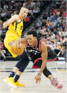  ?? RICK BOWMER/THE ASSOCIATED PRESS ?? Toronto Raptors guard Kyle Lowry has thrived despite the off-season trade of close friend DeMar DeRozan.