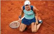  ?? CHRISTOPHE ENA / ASSOCIATED PRESS ?? Poland’s Iga Swiatek reacts as she defeats Coco Gauff of the U.S. during the women final match of the French Ope at the Roland Garros stadium Saturday in Paris. Swiatek won 6-1, 6-3.