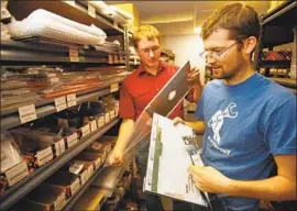  ?? Al Seib Los Angeles Times ?? KYLE WIENS, left, and Luke Soules, shown in 2012, are co-founders of IFixit, which distribute­s free repair guides and sells replacemen­t parts and tools.
