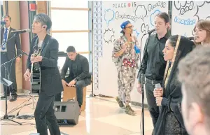  ??  ?? Japanese musician Miyavi (left), a goodwill ambassador for the UN High Commission­er for Refugees, performs with the Afghan rapper Sonita Alizadeh at UN headquarte­rs in New York on in January 2018.