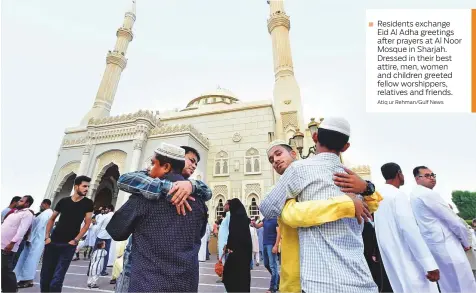  ?? Atiq ur Rehman/Gulf News ?? Residents exchange Eid Al Adha greetings after prayers at Al Noor Mosque in Sharjah. Dressed in their best attire, men, women and children greeted fellow worshipper­s, relatives and friends.