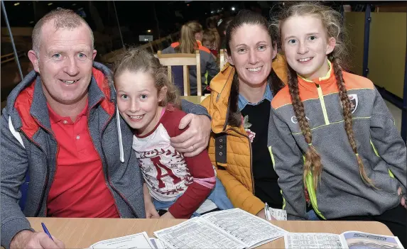  ??  ?? Tony and Anna O’Shea with their children Breda and Amy, from Tralee, enjoying their night out at the Kingdom Stadium and putting on a few bets before the implementa­tion of the betting law where under- 18s are no longer allowed to place bets at the...